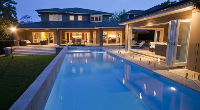 Stone and Glass Design Solutions for Your Swimming Pool