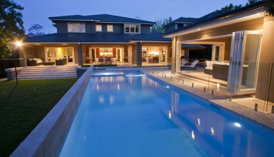 Stone and Glass Design Solutions for Your Swimming Pool