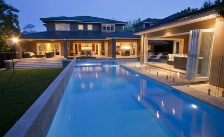 Stone and Glass Design Solutions for Your Swimming Pool