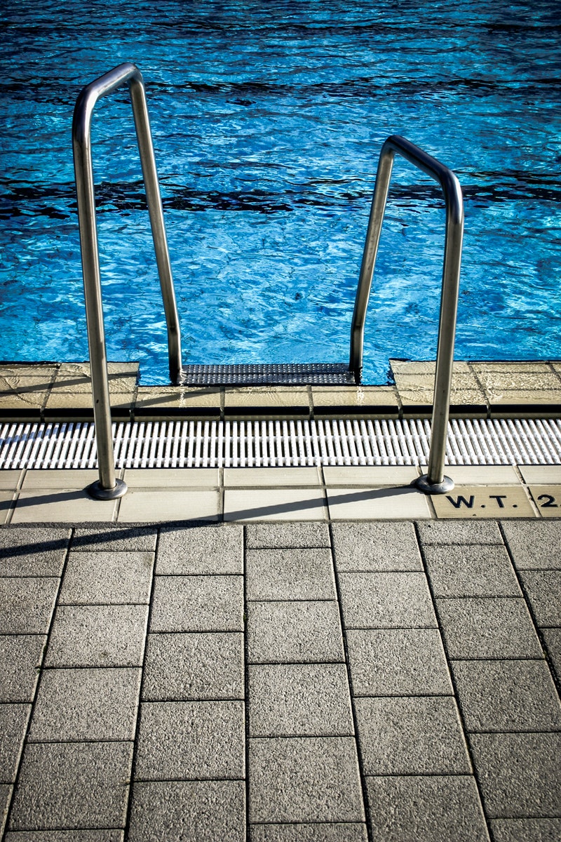 Pavers VS. Concrete: Which one is better for your pool decking?