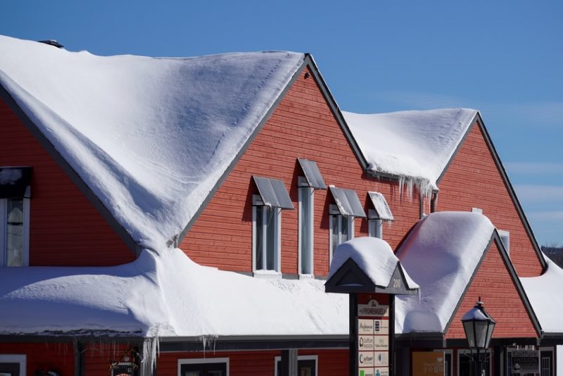 Ways That Snow Can Damage Your Roof and What to Do About It